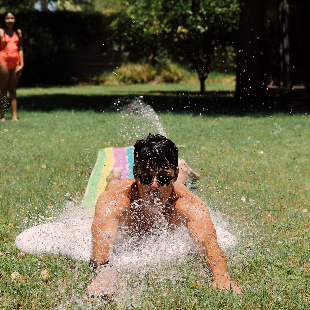 Rae Dunn: Splish Splash Rainbow Slide & Ride -16 Foot Water Slide Sprinkler, CocoNut Float, Durable Sliding Mat, Age 5+